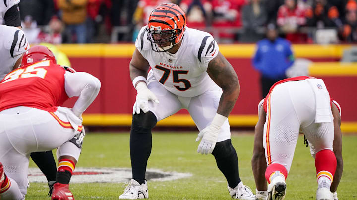 Dec 31, 2023; Kansas City, Missouri, USA; Cincinnati Bengals offensive tackle Orlando Brown Jr. (75) at the line of scrimmage against the Kansas City Chiefs during the game at GEHA Field at Arrowhead Stadium. Mandatory Credit: Denny Medley-Imagn Images