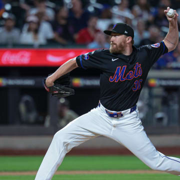Jul 26, 2024; New York City, New York, USA;  New York Mets relief pitcher Jake Diekman (30) delivers a pitch during the ninth inning against the Atlanta Braves at Citi Field. Mandatory Credit: Vincent Carchietta-USA TODAY Sports