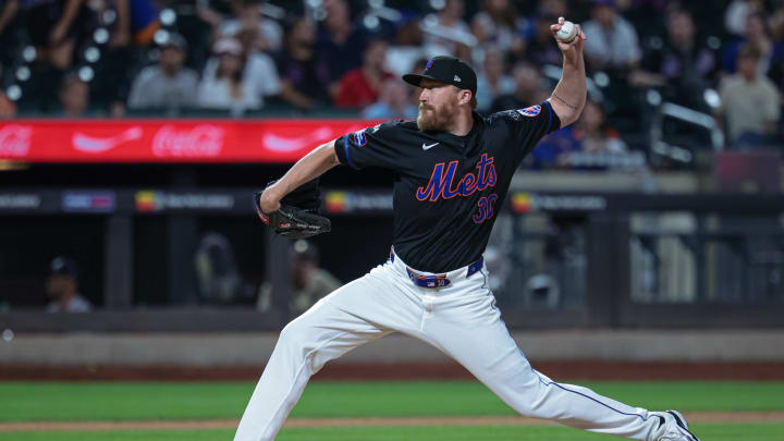 Jul 26, 2024; New York City, New York, USA;  New York Mets relief pitcher Jake Diekman (30) delivers a pitch during the ninth inning against the Atlanta Braves at Citi Field. Mandatory Credit: Vincent Carchietta-USA TODAY Sports