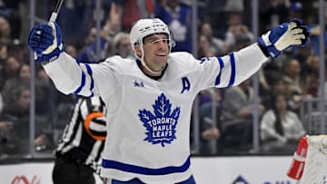 Mar 29, 2025; Los Angeles, California, USA;  Toronto Maple Leafs center John Tavares (91) celebrates after scoring in the third period against the Los Angeles Kings at Crypto.com Arena. Mandatory Credit: Jayne Kamin-Oncea-Imagn Images