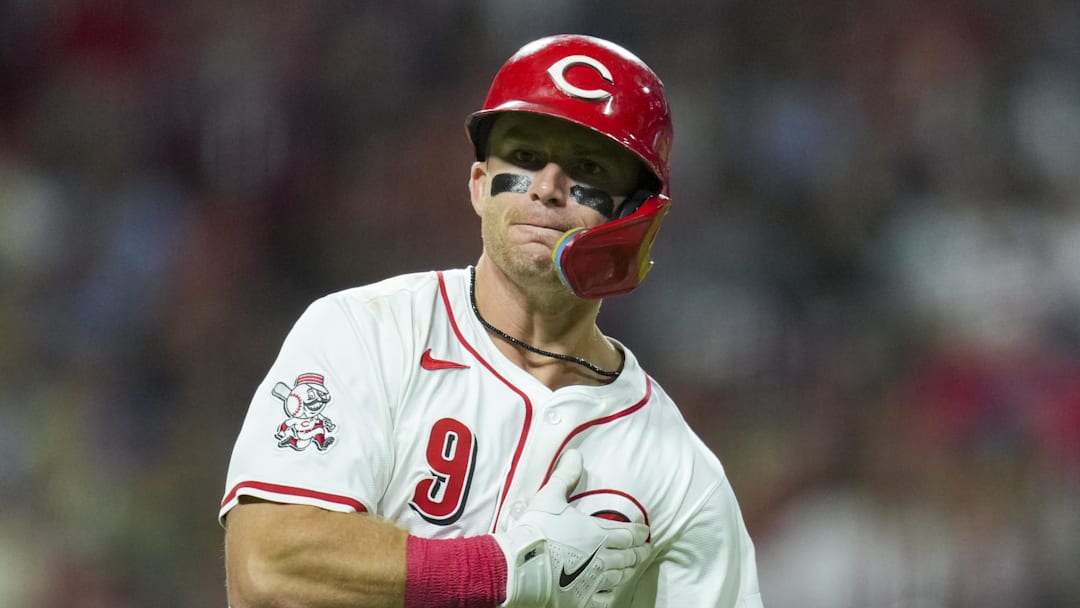 Aug 30, 2025; Cincinnati, Ohio, USA; Cincinnati Reds second baseman Matt McLain (9) hits a solo home run against the St. Louis Cardinals in the seventh inning at Great American Ball Park. Mandatory Credit: Aaron Doster-Imagn Images