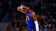 Mar 24, 2025; Denver, Colorado, USA; Denver Nuggets forward Peyton Watson (8) reacts after a basket in the third quarter against the Chicago Bulls at Ball Arena. Mandatory Credit: Isaiah J. Downing-Imagn Images