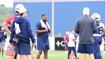Jul 24, 2024; Foxborough, MA, USA;  New England Patriots head coach Jerod Mayo watches over practice during training camp at Gillette Stadium. Mandatory Credit: Eric Canha-USA TODAY Sports