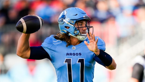Jun 9, 2024; Toronto, Ontario, CAN; Toronto Argonauts quarterback Cameron Dukes (11) throws a pass against the BC Lions at BMO Field. Mandatory Credit: Kevin Sousa-USA TODAY Sports