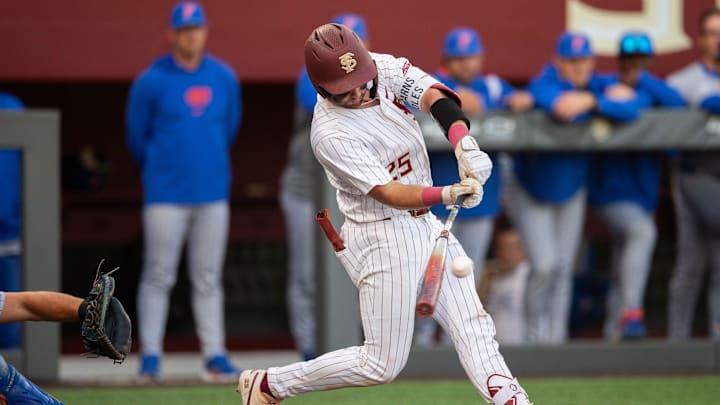 Florida State Seminoles catcher Hunter Carns (25) swings at a pitch. The Florida State Seminoles hosted the Florida Gators at Dick Howser Stadium on Tuesday, April 7, 2026.