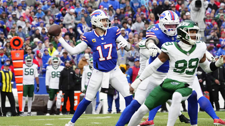 Buffalo Bills quarterback Josh Allen (17) throws the ball against the New York Jets Buffalo Bills quarterback Josh Allen (17) throws the ball against the New York Jets