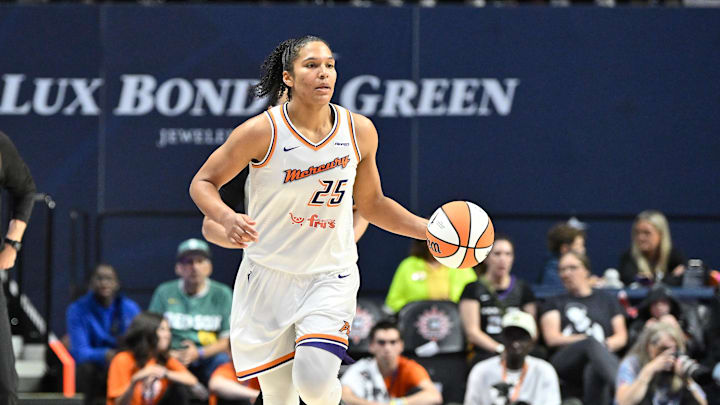 Jun 18, 2025; Uncasville, Connecticut, USA; Phoenix Mercury forward Alyssa Thomas (25) dribbles against the Connecticut Sun during the second half at Mohegan Sun Arena. Mandatory Credit: Eric Canha-Imagn Images Jun 18, 2025; Uncasville, Connecticut, USA; Phoenix Mercury forward Alyssa Thomas (25) dribbles against the Connecticut Sun during the second half at Mohegan Sun Arena. Mandatory Credit: Eric Canha-Imagn Images