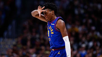 Mar 24, 2025; Denver, Colorado, USA; Denver Nuggets forward Peyton Watson (8) reacts after a basket in the third quarter against the Chicago Bulls at Ball Arena. Mandatory Credit: Isaiah J. Downing-Imagn Images