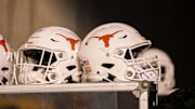 Texas Longhorns helmets sit in the tunnel at Mountaineer Field on Oct. 5, 2019 in Morgantown, West Virginia.