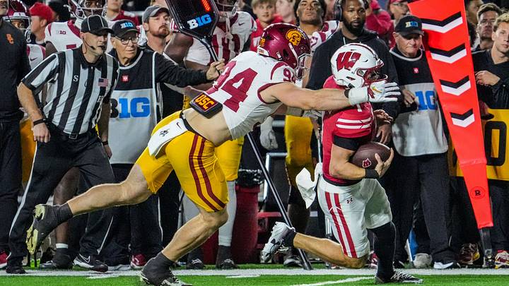 Wisconsin Badgers quarterback Colton Joseph (1) is caught by USC Trojans defensive end Luke Wafle (94) during their game Oct. 24, 2026, at Camp Randall Stadium in Madison, Wisconsin.