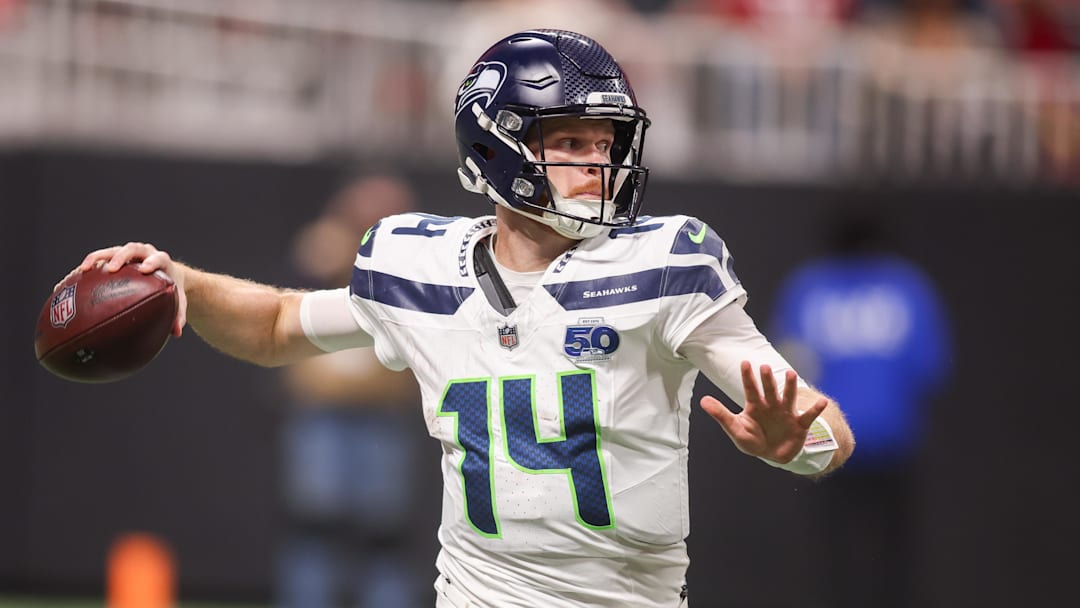 Dec 7, 2025; Atlanta, Georgia, USA; Seattle Seahawks quarterback Sam Darnold (14) throws a pass against the Atlanta Falcons in the third quarter at Mercedes-Benz Stadium. Mandatory Credit: Brett Davis-Imagn Images