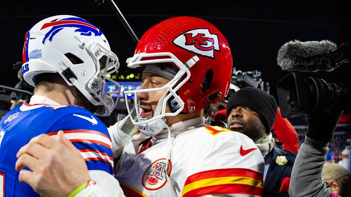 Kansas City Chiefs quarterback Patrick Mahomes (15) greets Buffalo Bills quarterback Josh Allen (17) 