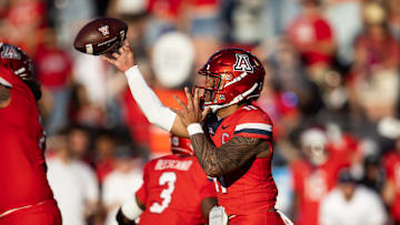 Nov 30, 2024; Tucson, Arizona, USA; Arizona Wildcats quarterback Noah Fifita (11) against the Arizona State Sun Devils in the second half during the Territorial Cup at Arizona Stadium. Mandatory Credit: Mark J. Rebilas-Imagn Images