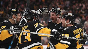 Feb 4, 2025; Pittsburgh, Pennsylvania, USA;  Pittsburgh Penguins defenseman Vincent Desharnais (7) and defenseman P.O Joseph (73) and left wing Anthony Beauvillier (72) congratulate right wing Kevin Hayes (13) on his goal against the New Jersey Devilsduring the third period at PPG Paints Arena. Mandatory Credit: Charles LeClaire-Imagn Images