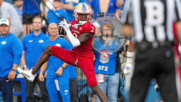 Sep 23, 2023; Lawrence, Kansas, USA; Kansas Jayhawks cornerback Cobee Bryant (2) intercepts a pass during the second half against the Brigham Young Cougars at David Booth Kansas Memorial Stadium.