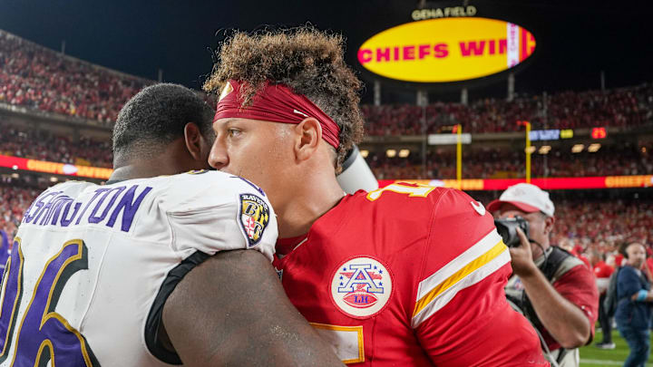 Sep 5, 2024; Kansas City, Missouri, USA; Kansas City Chiefs quarterback Patrick Mahomes (15) embraces Baltimore Ravens defensive tackle Broderick Washington (96) on field after the win over the game at GEHA Field at Arrowhead Stadium. Mandatory Credit: Denny Medley-Imagn Images