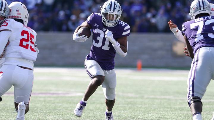 Oct 28, 2023; Manhattan, Kansas, USA; Kansas State Wildcats running back DJ Giddens (31) runs for the first down against Houston.