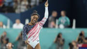 Jul 30, 2024; Paris, France; Simone Biles of the United States holds up the number one after the women’s team final at the Paris 2024 Olympic Summer Games at Bercy Arena. 