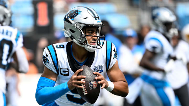 Carolina Panthers quarterback Bryce Young looks to throw a pass.