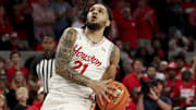 Nov 3, 2025; Houston, Texas, USA; Houston Cougars guard Emanuel Sharp (21) drives to the basket during the first half against the Lehigh Mountain Hawks at Fertitta Center. Mandatory Credit: Maria Lysaker-Imagn Images 