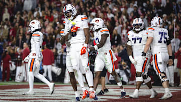 Nov 30, 2024; Tuscaloosa, Alabama, USA; Auburn Tigers wide receiver Cam Coleman (8) celebrates after scoring a touchdown against the Alabama Crimson Tide during the third quarter at Bryant-Denny Stadium. Mandatory Credit: Will McLelland-Imagn Images