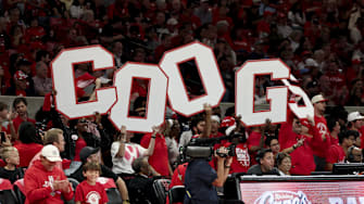 The Houston Cougars student section hold up cut out letter spelling “COOGS” during the game against the Lehigh Mountain Hawks at Fertitta Center. 