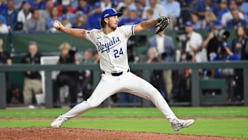 Oct 9, 2024; Kansas City, Missouri, USA; Kansas City Royals pitcher Michael Lorenzen (24) pitches in the ninth inning against the New York Yankees during game three of the NLDS for the 2024 MLB Playoffs at Kauffman Stadium.