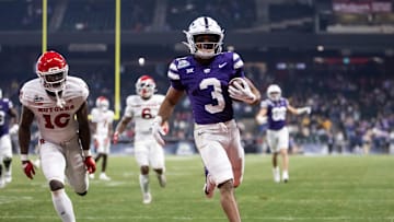 Dec 26, 2024; Phoenix, AZ, USA; Kansas State Wildcats running back Dylan Edwards (3) runs for a touchdown against the Rutgers Scarlet Knights during the second half of the Rate Bowl at Chase Field. Mandatory Credit: Mark J. Rebilas-Imagn Images