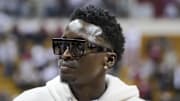 Feb 22, 2024; Bloomington, Indiana, USA;  Indiana Pacer   s Victor Oladipo stands on the court after the game between the Iowa Hawkeyes and the Indiana Hoosiers at Simon Skjodt Assembly Hall. Mandatory Credit: Aaron Doster-Imagn Images