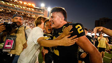Oct 5, 2024; Nashville, Tennessee, USA;  Vanderbilt Commodores quarterback Diego Pavia (2) celebrates after an upset victory over the Alabama Crimson Tide at FirstBank Stadium. Mandatory Credit: Steve Roberts-Imagn Images