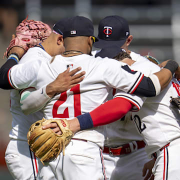 Sep 15, 2024; Minneapolis, Minnesota, USA; Minnesota Twins players huddle on the field after defeating the Cincinnati Reds at Target Field. Mandatory Credit: Jesse Johnson-Imagn Images