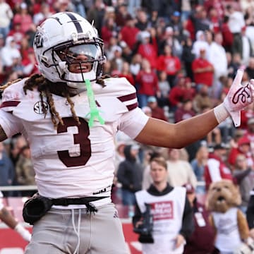 Mississippi State Bulldogs wide receiver Anthony Evans III (3) looks for a pass interference call after a play in the fourth quarter against the Arkansas Razorbacks at Donald W. Reynolds Razorback Stadium. Bulldogs won 38-35. 
