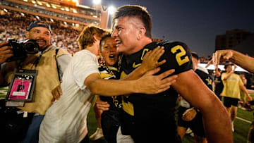 Oct 5, 2024; Nashville, Tennessee, USA;  Vanderbilt Commodores quarterback Diego Pavia (2) celebrates after an upset victory over the Alabama Crimson Tide at FirstBank Stadium. Mandatory Credit: Steve Roberts-Imagn Images