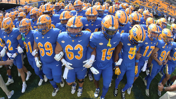 Oct 12, 2024; Pittsburgh, Pennsylvania, USA; The Pittsburgh Panthers take the field to warm up before playing the California Golden Bears at Acrisure Stadium. Mandatory Credit: Charles LeClaire-Imagn Images Oct 12, 2024; Pittsburgh, Pennsylvania, USA; The Pittsburgh Panthers take the field to warm up before playing the California Golden Bears at Acrisure Stadium. Mandatory Credit: Charles LeClaire-Imagn Images