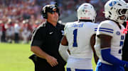 Eastern Illinois Panthers head coach Chris Wilkerson huddles during a time out during the first half against the Alabama Crimson Tide at Saban Field at Bryant-Denny Stadium. 