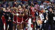 Mar 8, 2025; Auburn, Alabama, USA; Alabama Crimson Tide guard Mark Sears (1) celebrates with teammates after making the game winning shot to beat the Auburn Tigers in overtime at Neville Arena. Mandatory Credit: John Reed-Imagn Images