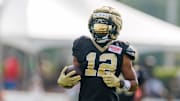 Jul 30, 2025; New Orleans, LA, USA;  New Orleans Saints wide receiver Chris Olave (12)  during training camp at Ochsner Sports Performance Center. Mandatory Credit: Stephen Lew-Imagn Images