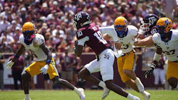 Sep 7, 2024; College Station, Texas, USA; Texas A&M Aggies quarterback Marcel Reed (10) runs the ball against the McNeese State Cowboys during the second quarter at Kyle Field. Mandatory Credit: Dustin Safranek-Imagn Images