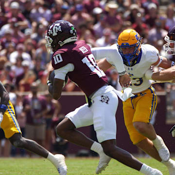 Sep 7, 2024; College Station, Texas, USA; Texas A&M Aggies quarterback Marcel Reed (10) runs the ball against the McNeese State Cowboys during the second quarter at Kyle Field. Mandatory Credit: Dustin Safranek-Imagn Images