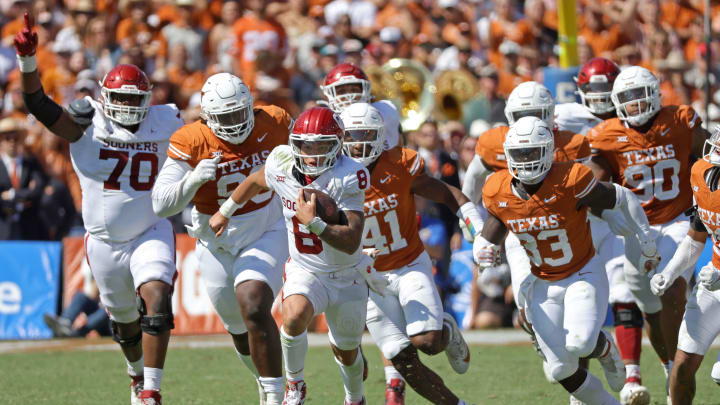 Oklahoma quarterback Dillon Gabriel (8) carries the ball during his team's game against Texas at the Cotton Bowl in Dallas, Saturday, Oct. 7, 2023.