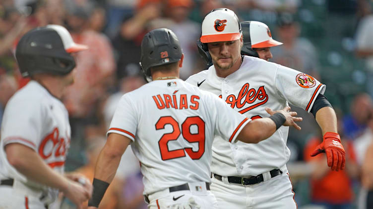 Jun 13, 2023; Baltimore, Maryland, USA; Baltimore Orioles designated hitter Gunnar Henderson (2) celebrates with Ramón Urías