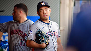 Sep 13, 2024; Anaheim, California, USA; Houston Astros pitcher Yusei Kikuchi (16) watches game action against the Los Angeles Angels during the first inning at Angel Stadium. Mandatory Credit: Gary A. Vasquez-Imagn Images