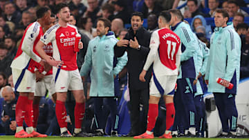 Mikel Arteta (centre) and his players have endured some highs and more lows this season