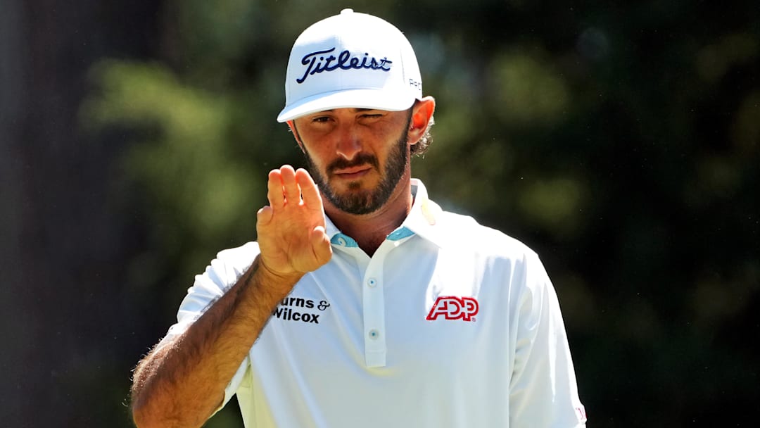 Apr 12, 2024; Augusta, Georgia, USA; Max Homa lines up his putt on the sixth green during the second