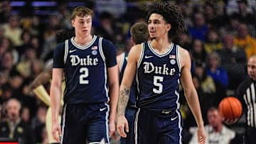 Jan 25, 2025; Winston-Salem, North Carolina, USA; Duke basketball guard Cooper Flagg (2) and guard Tyrese Proctor (5) against the Wake Forest Demon Deacons at Lawrence Joel Veterans Memorial Coliseum.