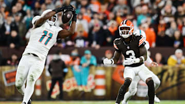 Cleveland Browns wide receiver Jerry Jeudy (3) watches as Miami Dolphins linebacker Tyrel Dodson (11) intercepts the pass during the first half at Huntington Bank Field.