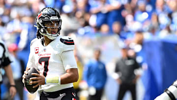 Sep 8, 2024; Indianapolis, Indiana, USA;  Houston Texans quarterback C.J. Stroud (7) looks for a teammate during the first quarter against the Indianapolis Colts at Lucas Oil Stadium. Mandatory Credit: Marc Lebryk-Imagn Images