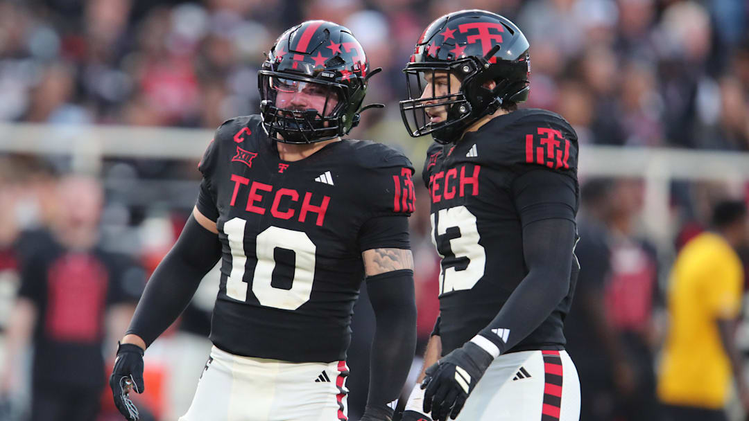 Texas Tech Red Raiders defensive back Jacob Rodriguez (10) and defensive back Ben Roberts (13) in the first half during the game against the Kansas Jayhawks at Jones AT&T Stadium.