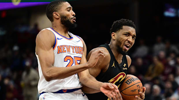 Donovan Mitchell (45) drives to the basket.