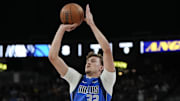 Oct 15, 2025; Las Vegas, Nevada, USA; Dallas Mavericks forward Cooper Flagg (32) shoots the ball during the first half against the Los Angeles Lakers at T-Mobile Arena. Mandatory Credit: Lucas Peltier-Imagn Images